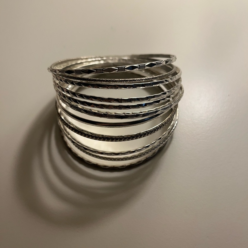 12 silver bracelets